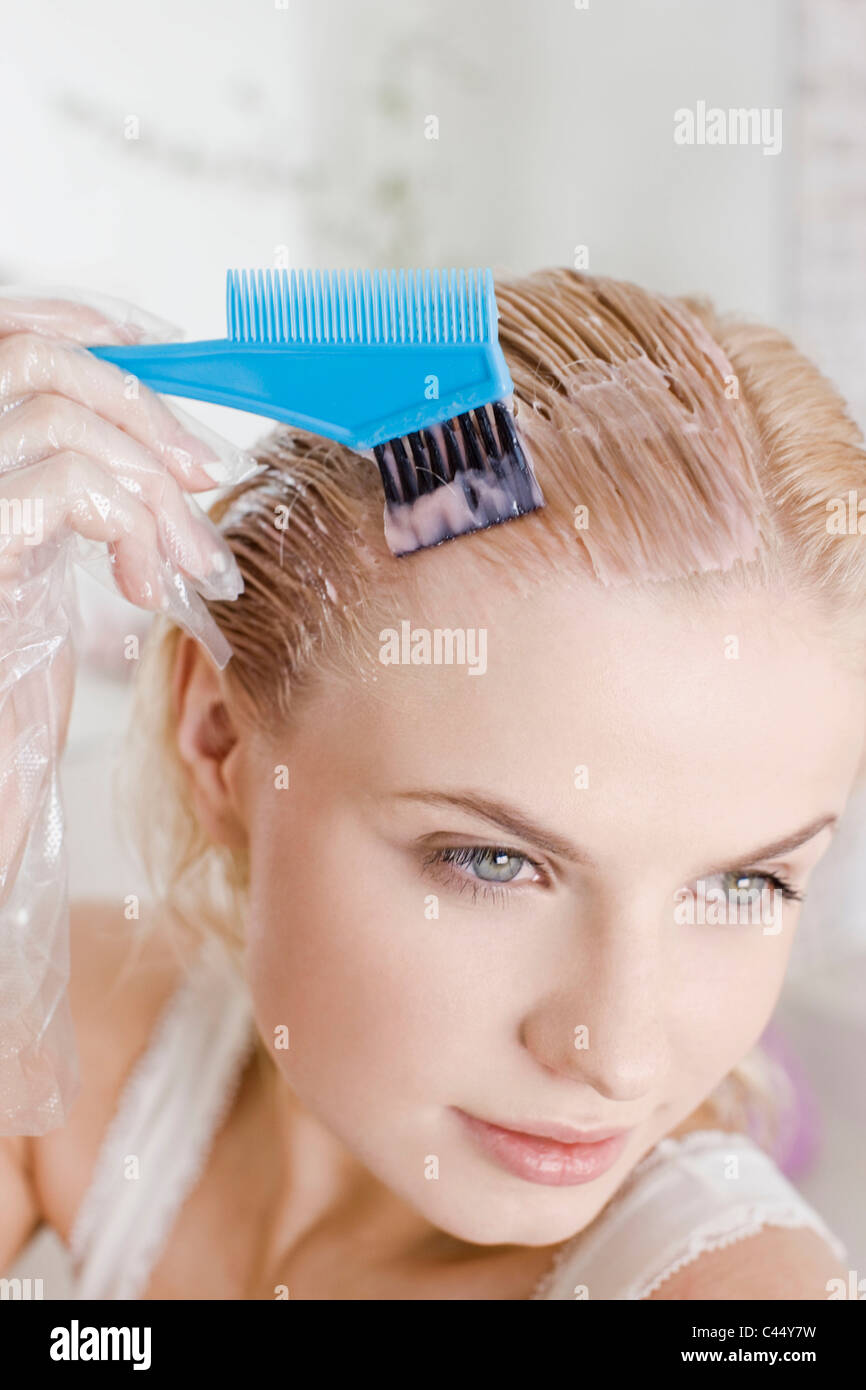 Woman dye hair Stock Photo