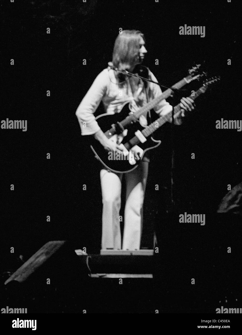 Mike Rutherford of the progressive rock band Genesis in performance, 1975. Stock Photo