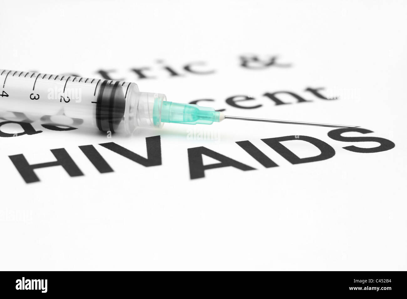 Pills on hiv - aids background Stock Photo - Alamy