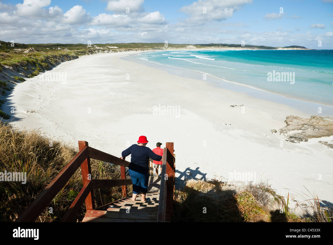 Couple walking down to beach at Twilight Cove. Esperance, Western Australia, Australia Stock Photo
