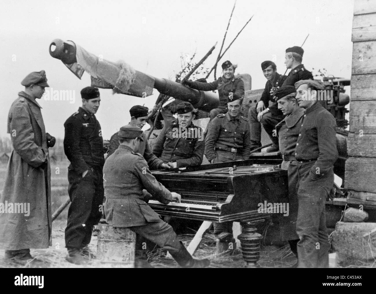 Nazi German soldiers make music, 1943 Stock Photo