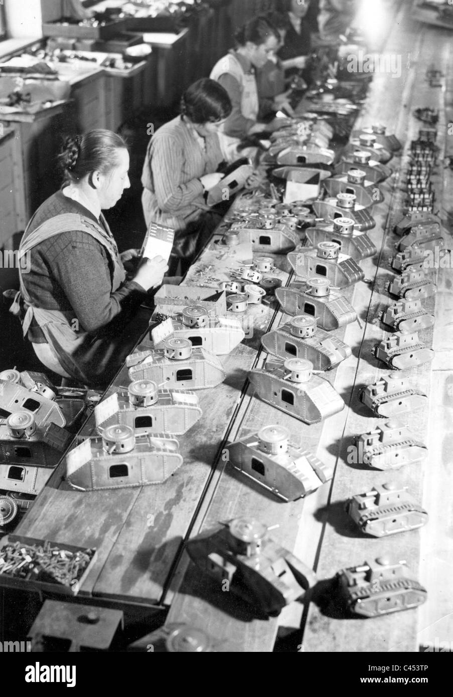 Production of war toys, 1934 Stock Photo