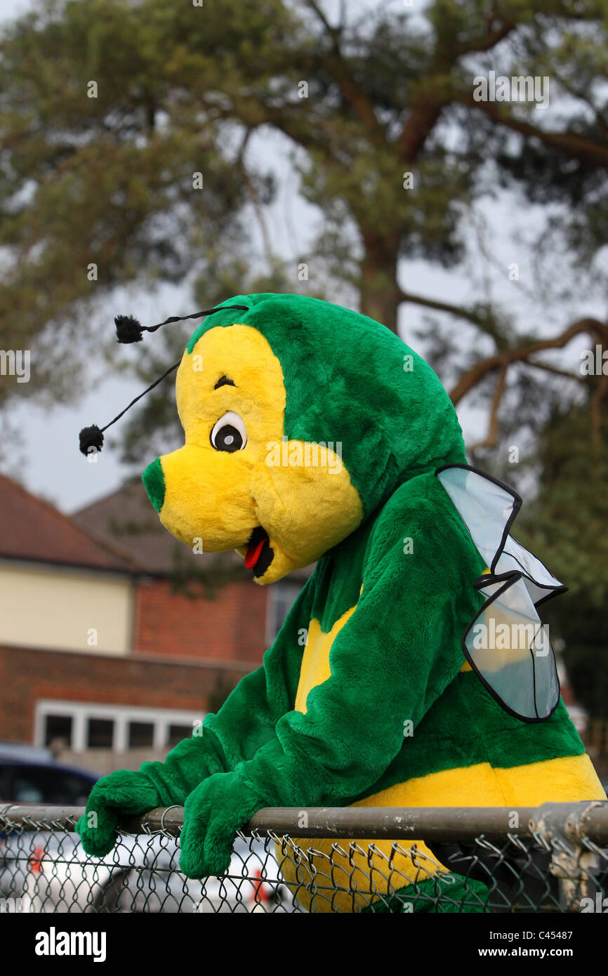 A football team's mascot pictured watching his teams game in Horsham, Sussex, UK. Stock Photo
