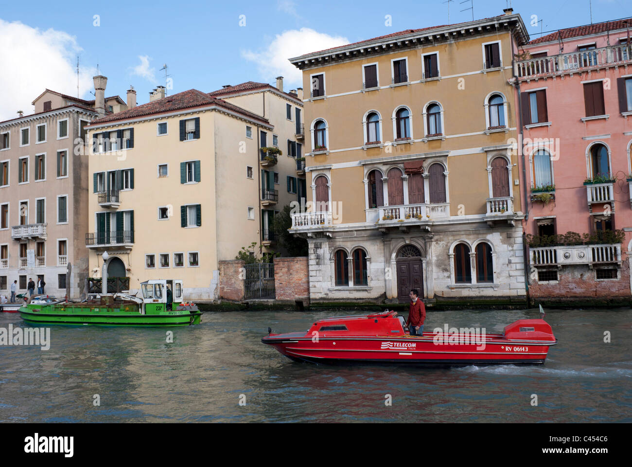 A Telecom Italia maintenance boat on the Grand Canal in Venice, Italy Stock Photo