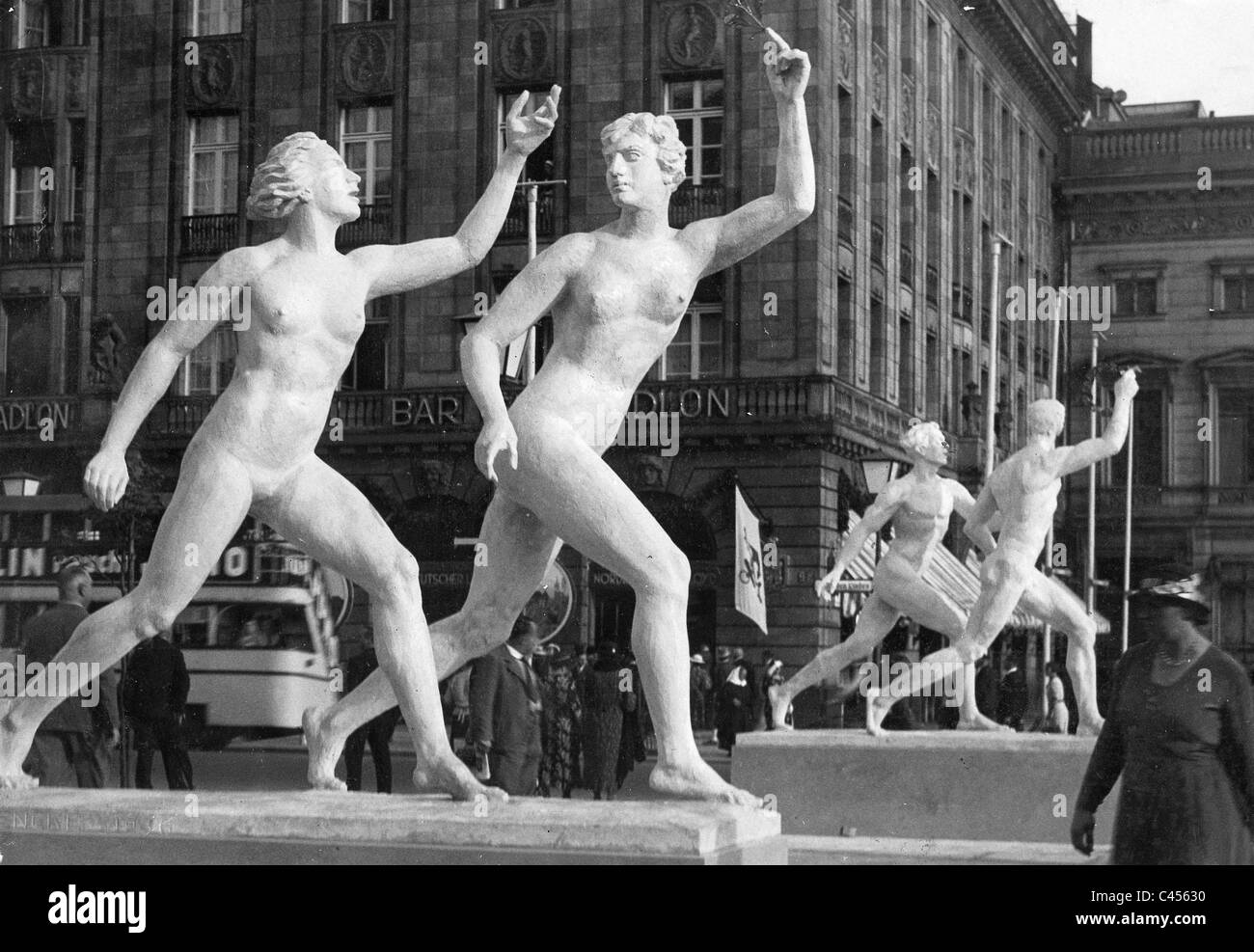 Sculptures of athletes in front of the Hotel Adlon in Berlin Stock Photo