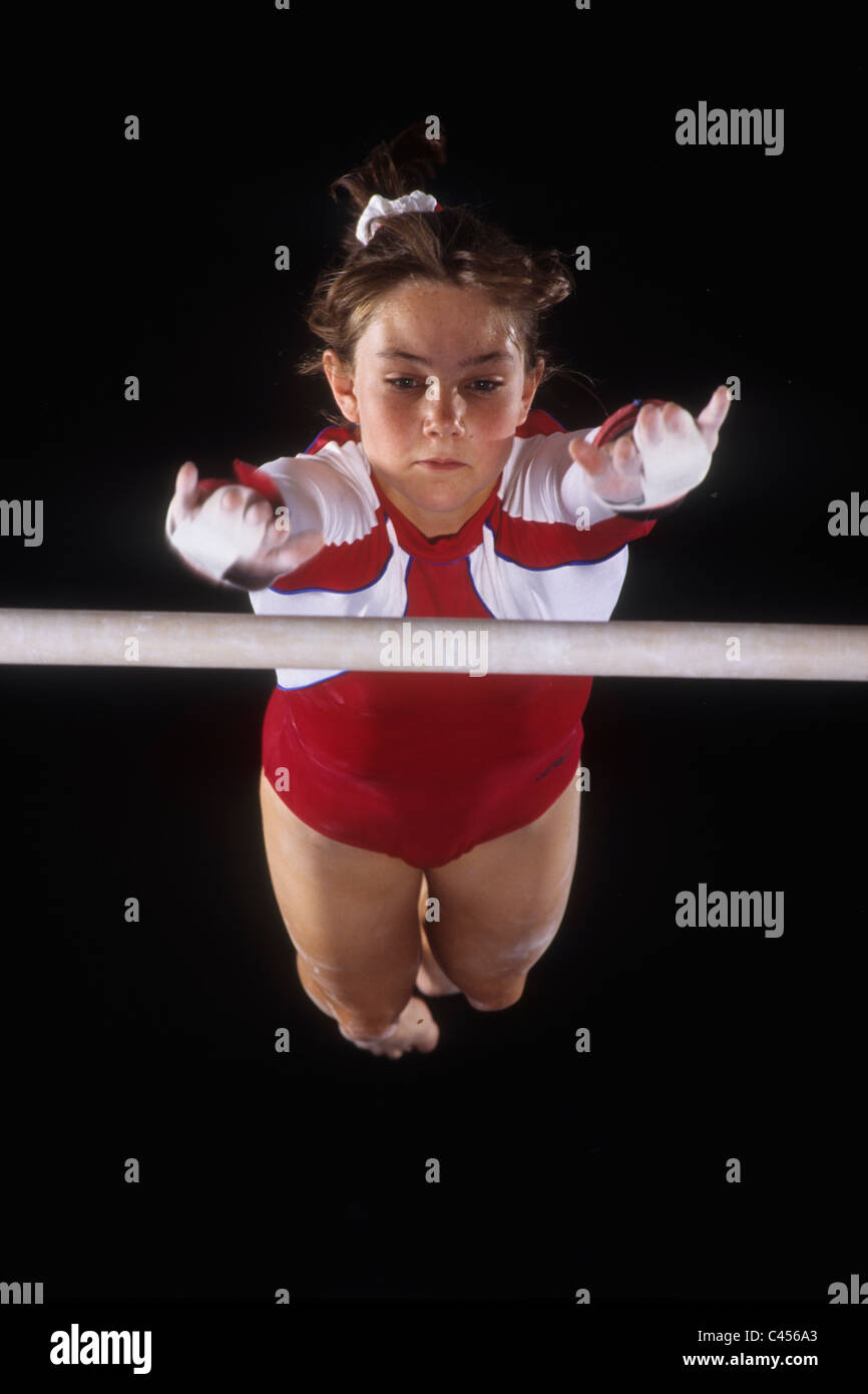 Female gymnast on the uneven bars Stock Photo Alamy