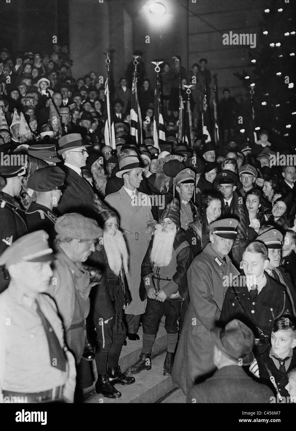 Hjalmar Schacht, and Joseph Goebbels at the opening of Berlin's Christmas market, 1934 Stock Photo