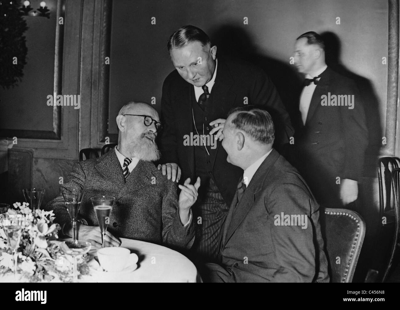 Robert Bosch with Allmers and Sablotnik at the International Motor Show, 1937 Stock Photo