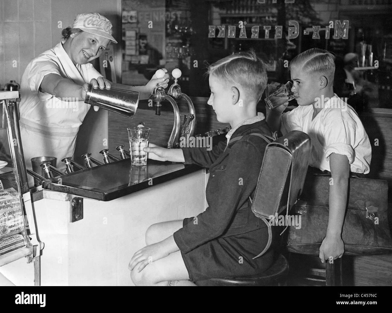 Students in a milk bar in Berlin, 1936 Stock Photo Alamy