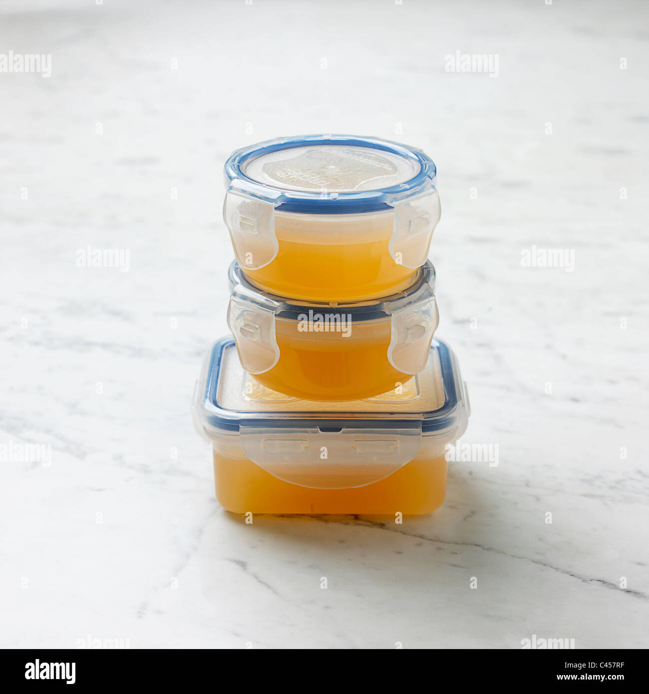 Three freezer pots of pectin juice, close-up Stock Photo