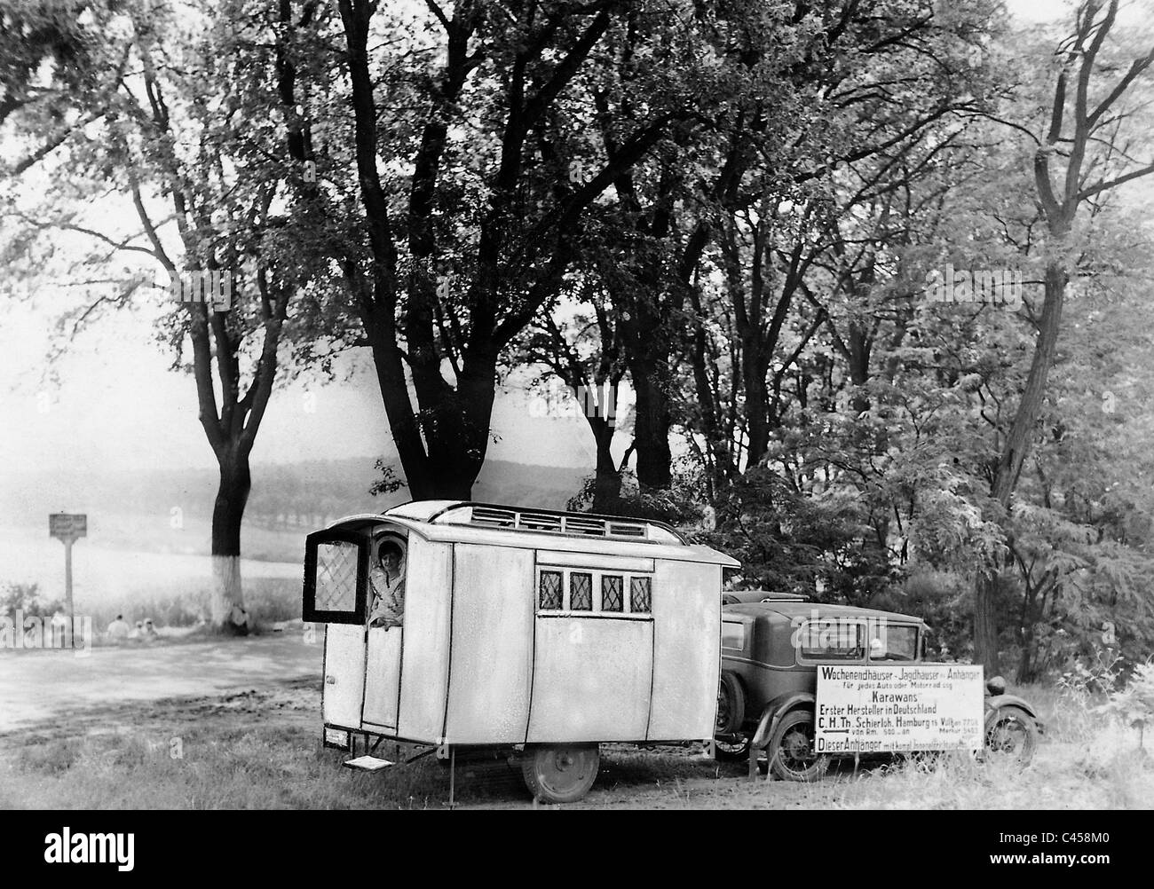 Car with camping trailer, 1930 Stock Photo