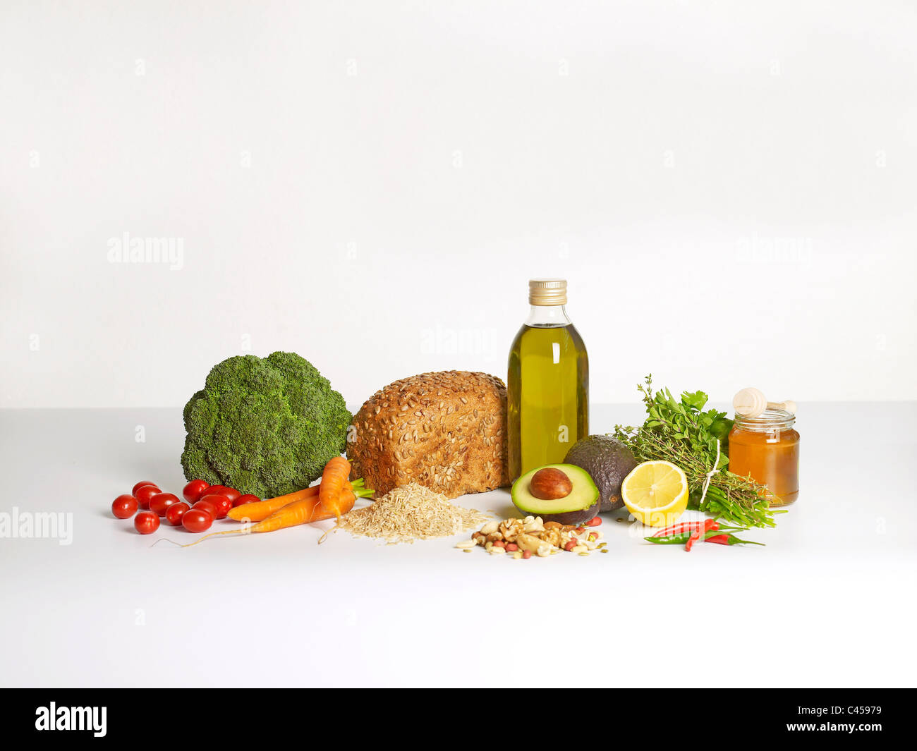 Various basic ingredients on white background Stock Photo - Alamy