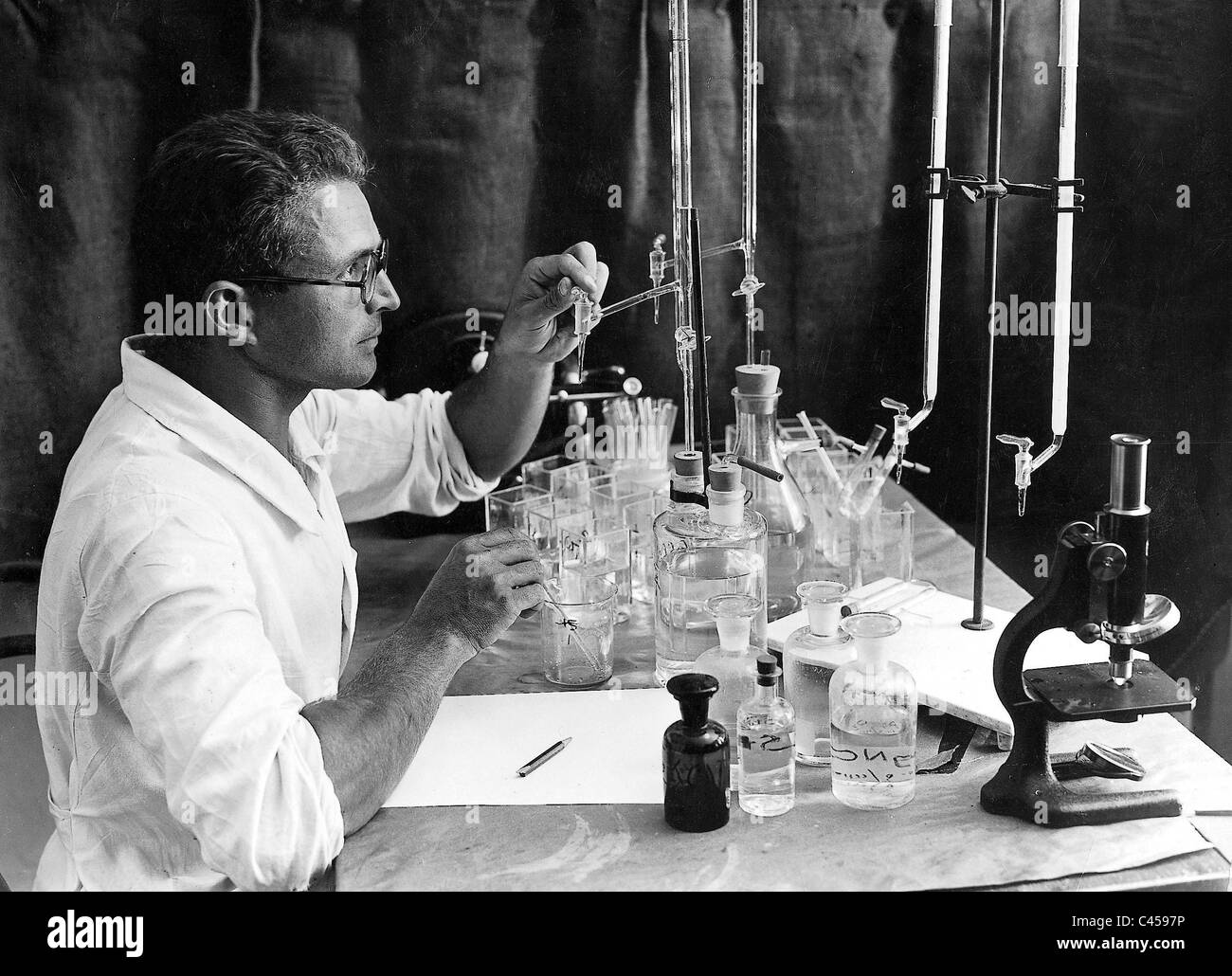 Chemists analyzes chemical samples, 1931 Stock Photo Alamy