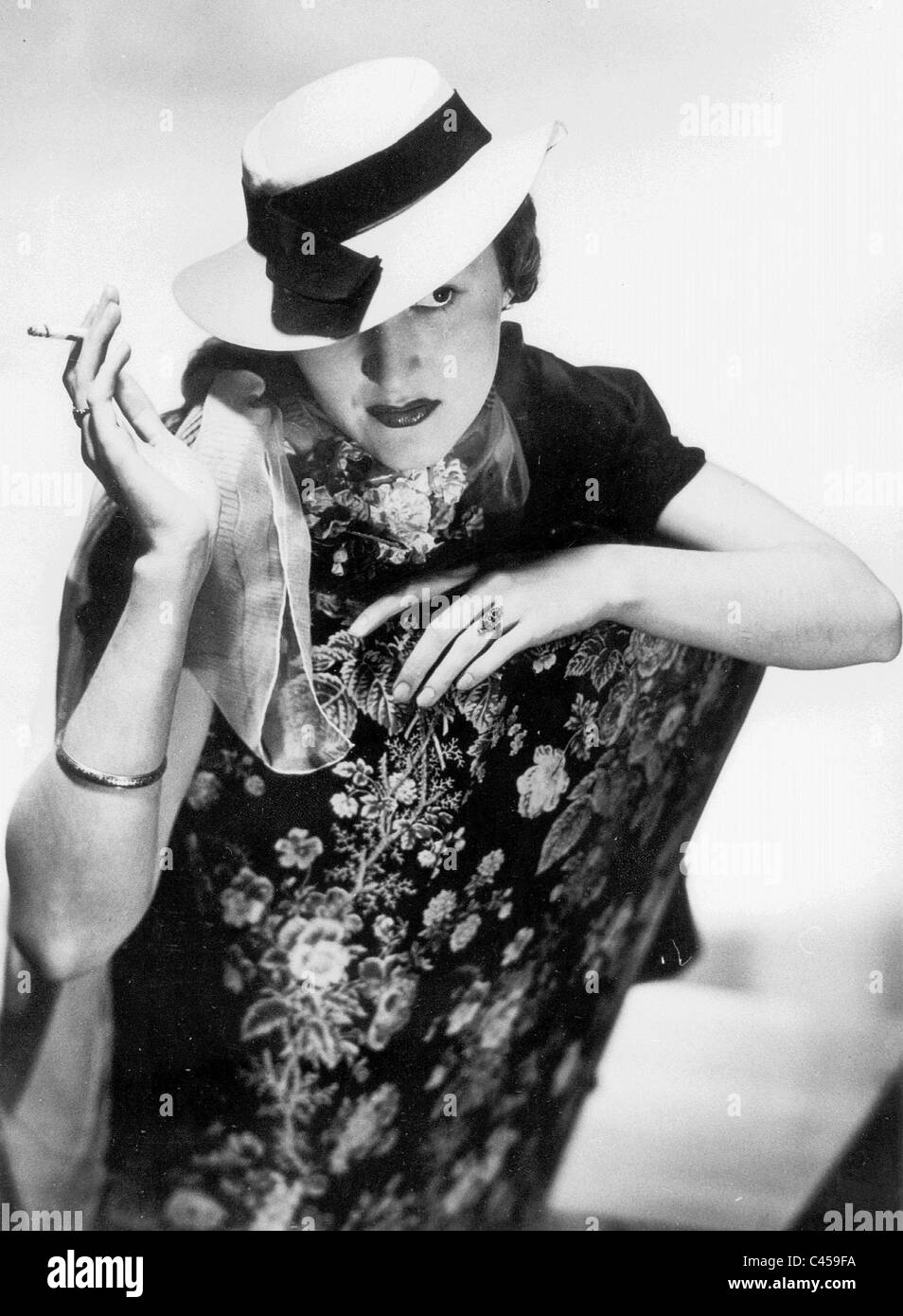 Woman with hat and cigarette, 1937 Stock Photo