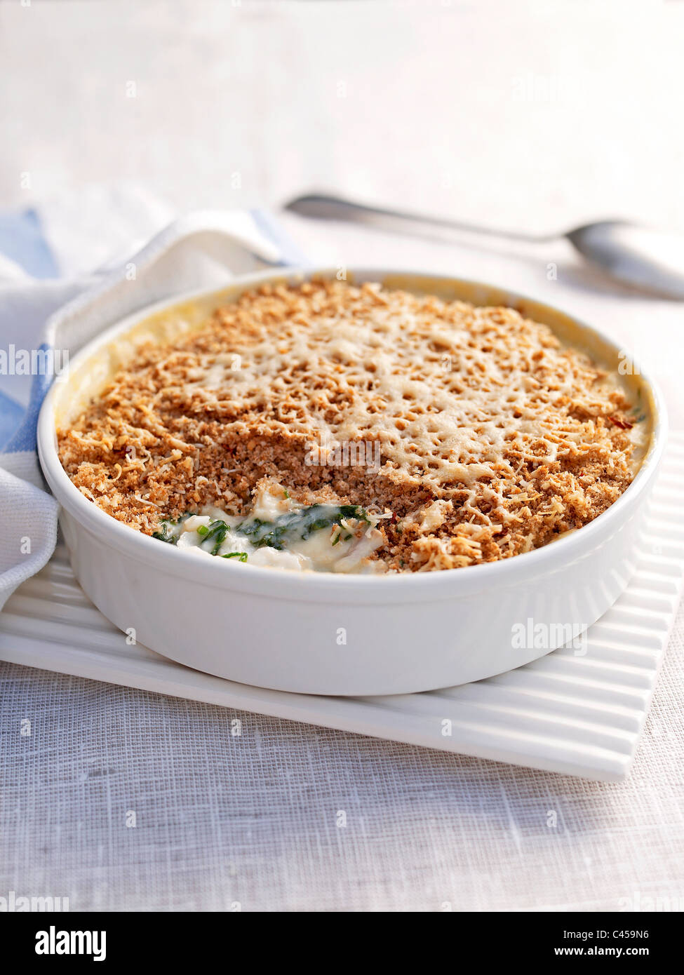 Haddock gratin in souffle dish, closeup Stock Photo Alamy
