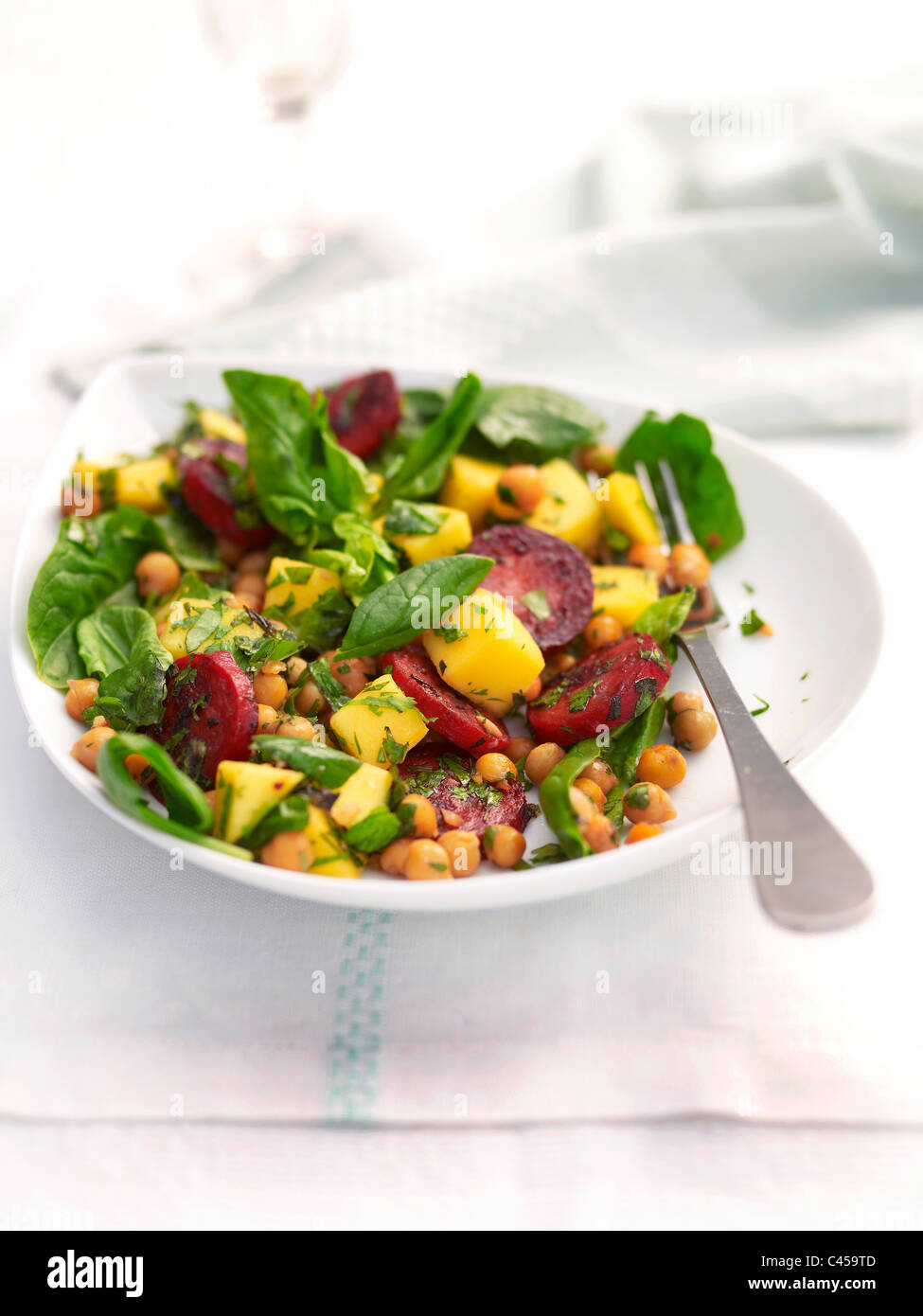 Bowl of chorizo mango salad, close-up Stock Photo
