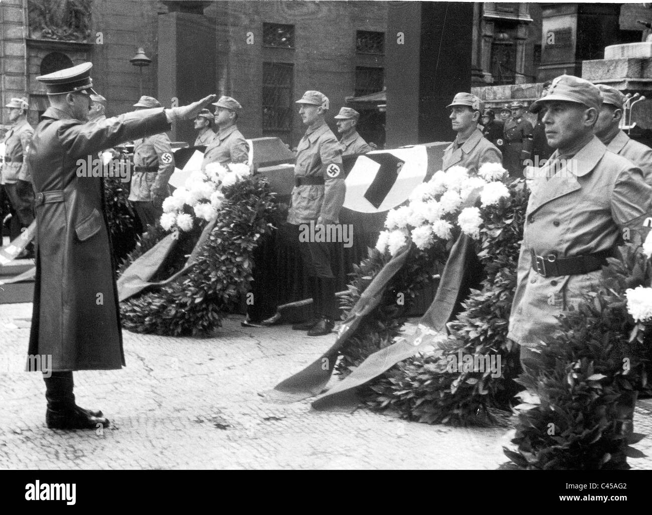 Adolf Hitler at the funeral service for victims of the attack in the ...