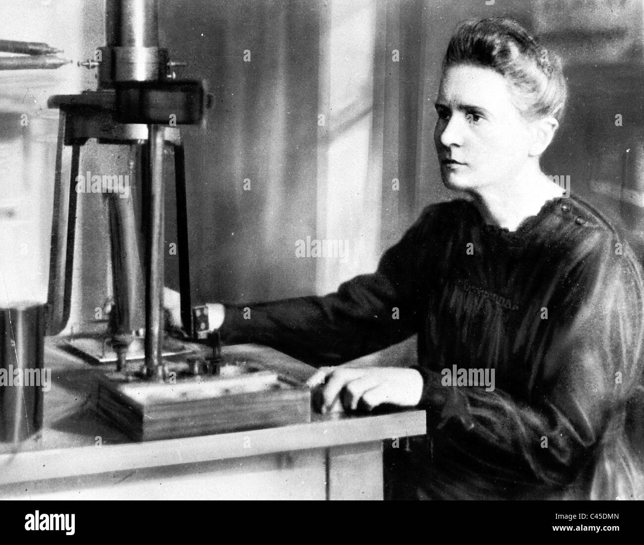 Marie Curie in a laboratory Stock Photo