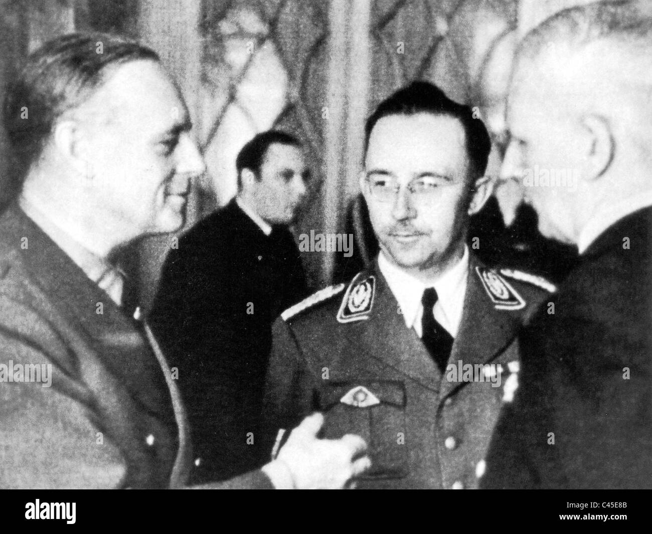 Ribbentrop, Himmler and Weizsaecker on a diplomatic reception at the Hotel Adlon, Berlin 1942 Stock Photo