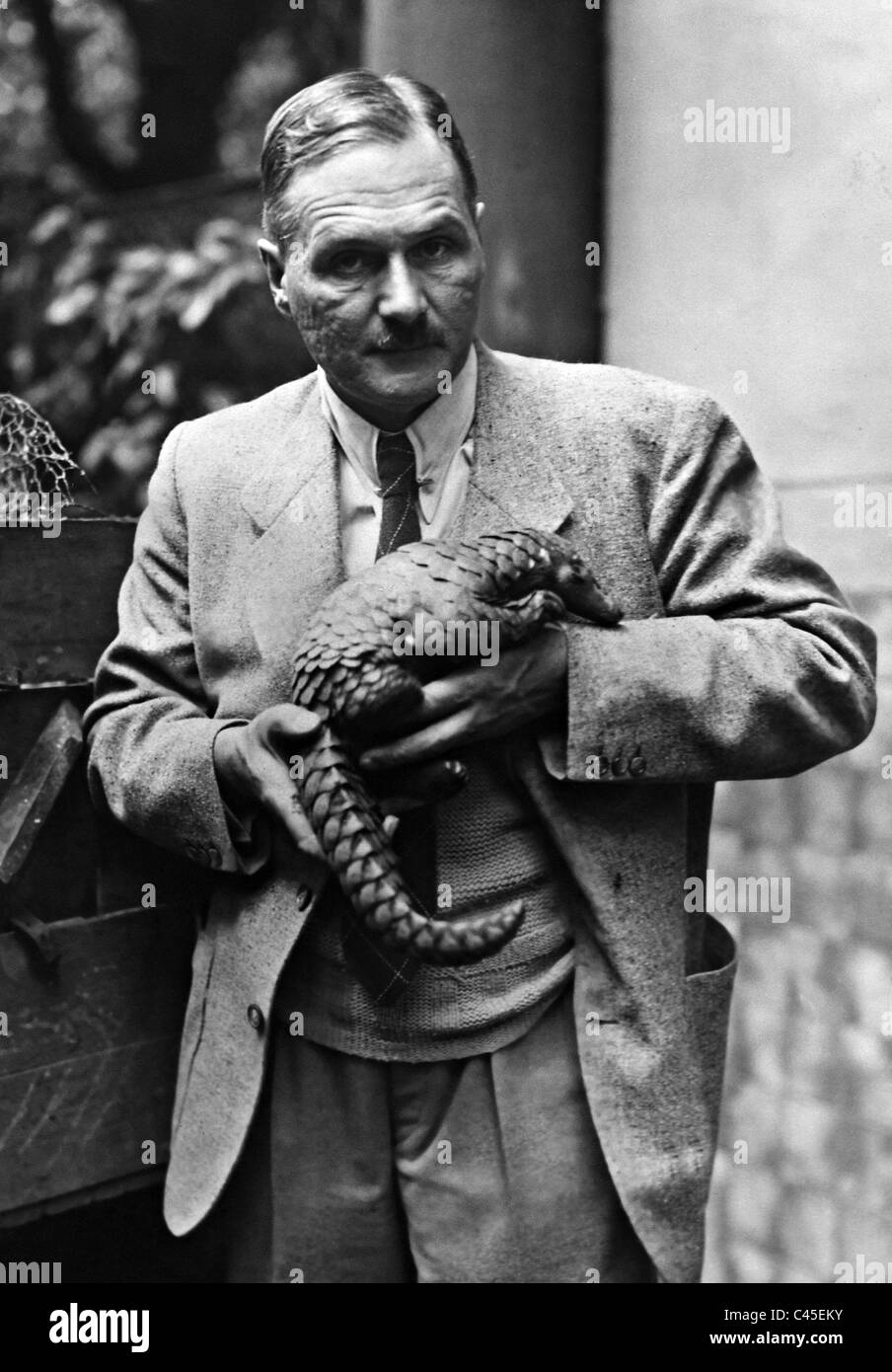 Lutz Heck with a scaly anteater, 1940 Stock Photo