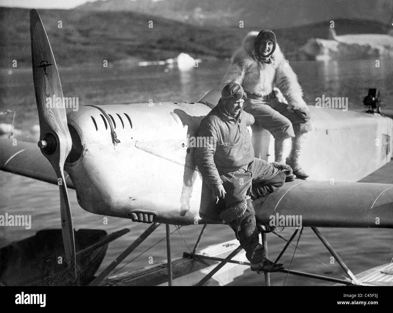 Ernst Udet and Leni Riefenstahl at the filming of S.O.S. Eisberg in Greenland, 1933 Stock Photo