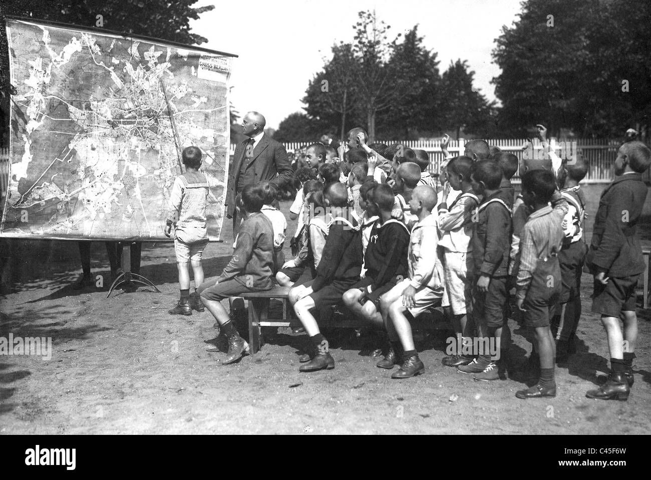 Students at a geography lesson, 1921 Stock Photo