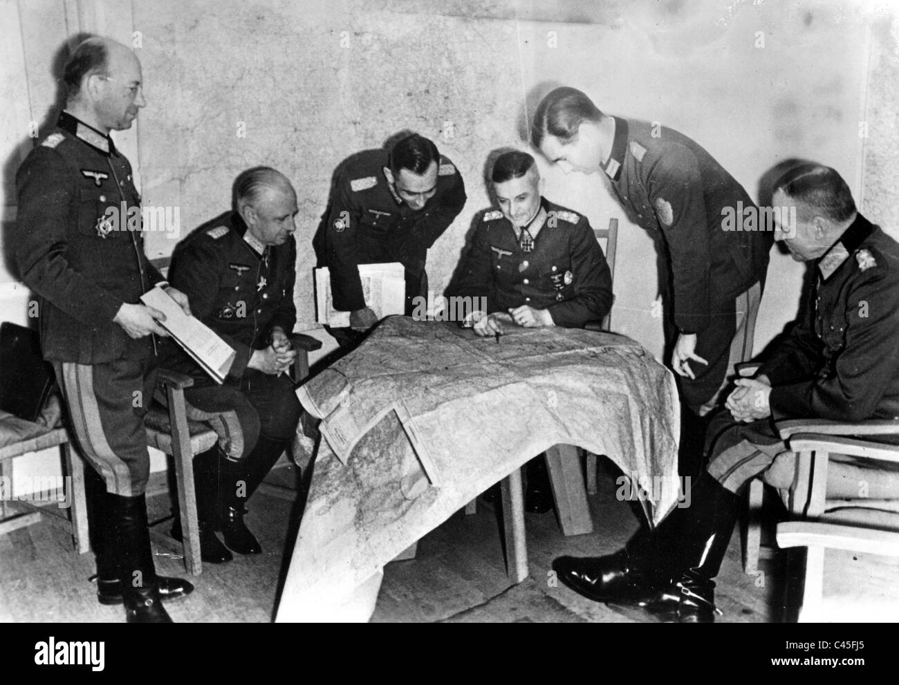Walter Model with officers at a briefing session Stock Photo