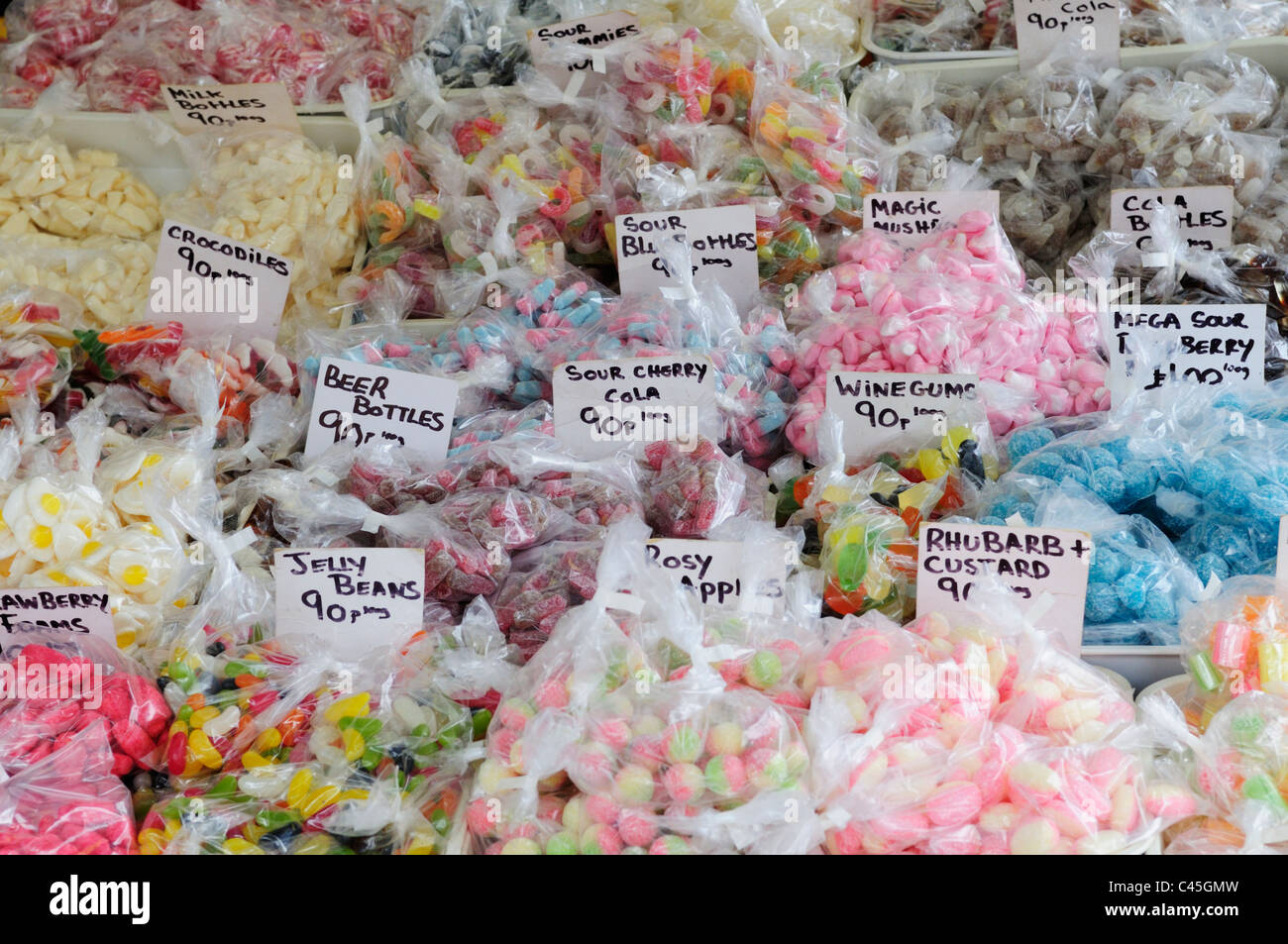 Bags of Sweets for sale on Cambridge Market, Cambridgeshire, England, Uk Stock Photo