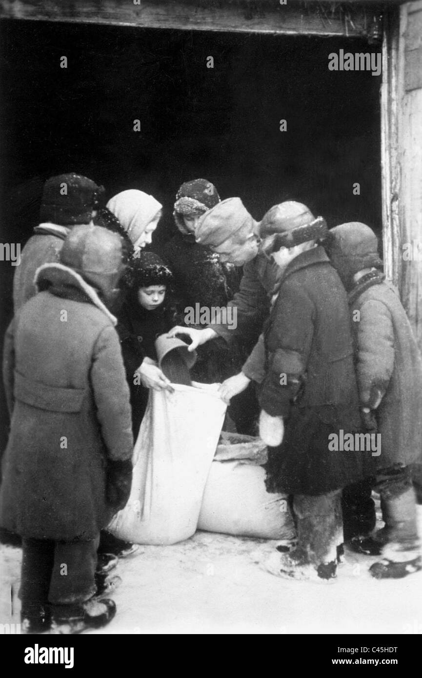 Distribution of food to the population on the Eastern Front, 1941 Stock Photo