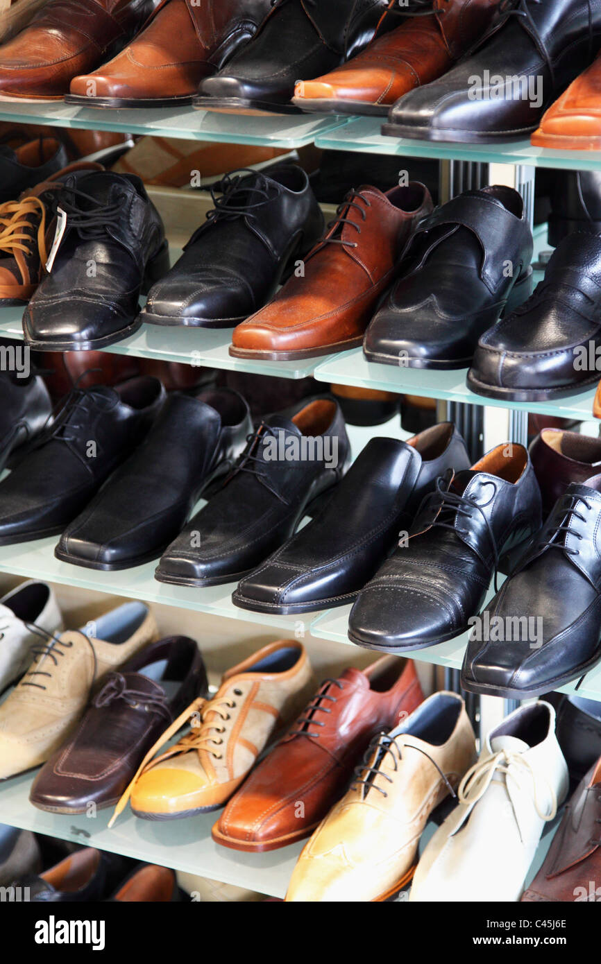 lots of men shoes in a footwear shop Stock Photo - Alamy display picture 2