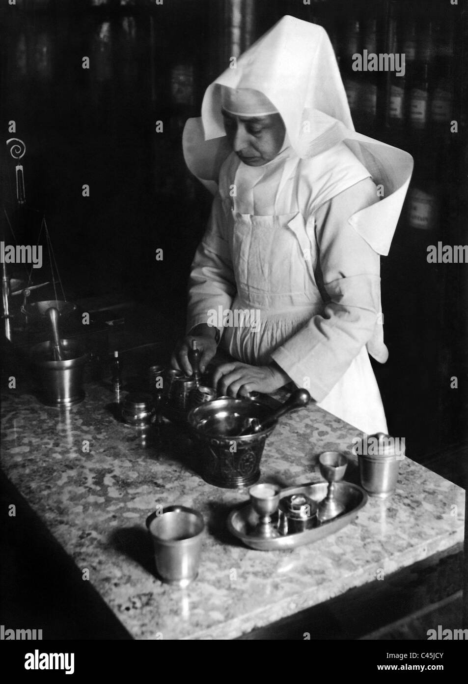 Nun in the 'Hospital Hotel-Dieu' in Beaune, 1932 Stock Photo