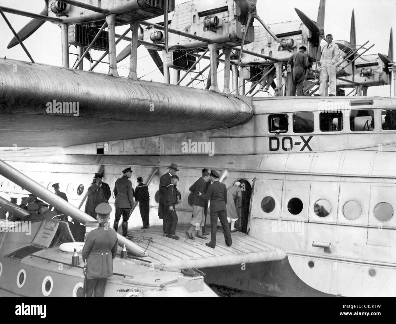 Passengers board a Dornier Do X seaplane, 1932 Stock Photo