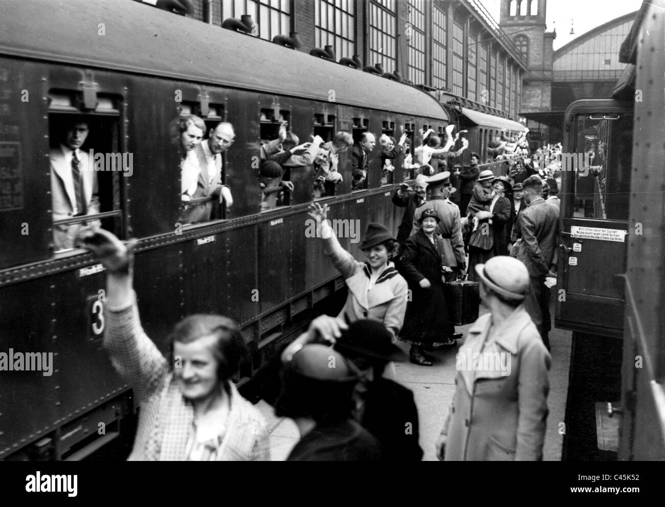 Departure at a train station, 1937 Stock Photo