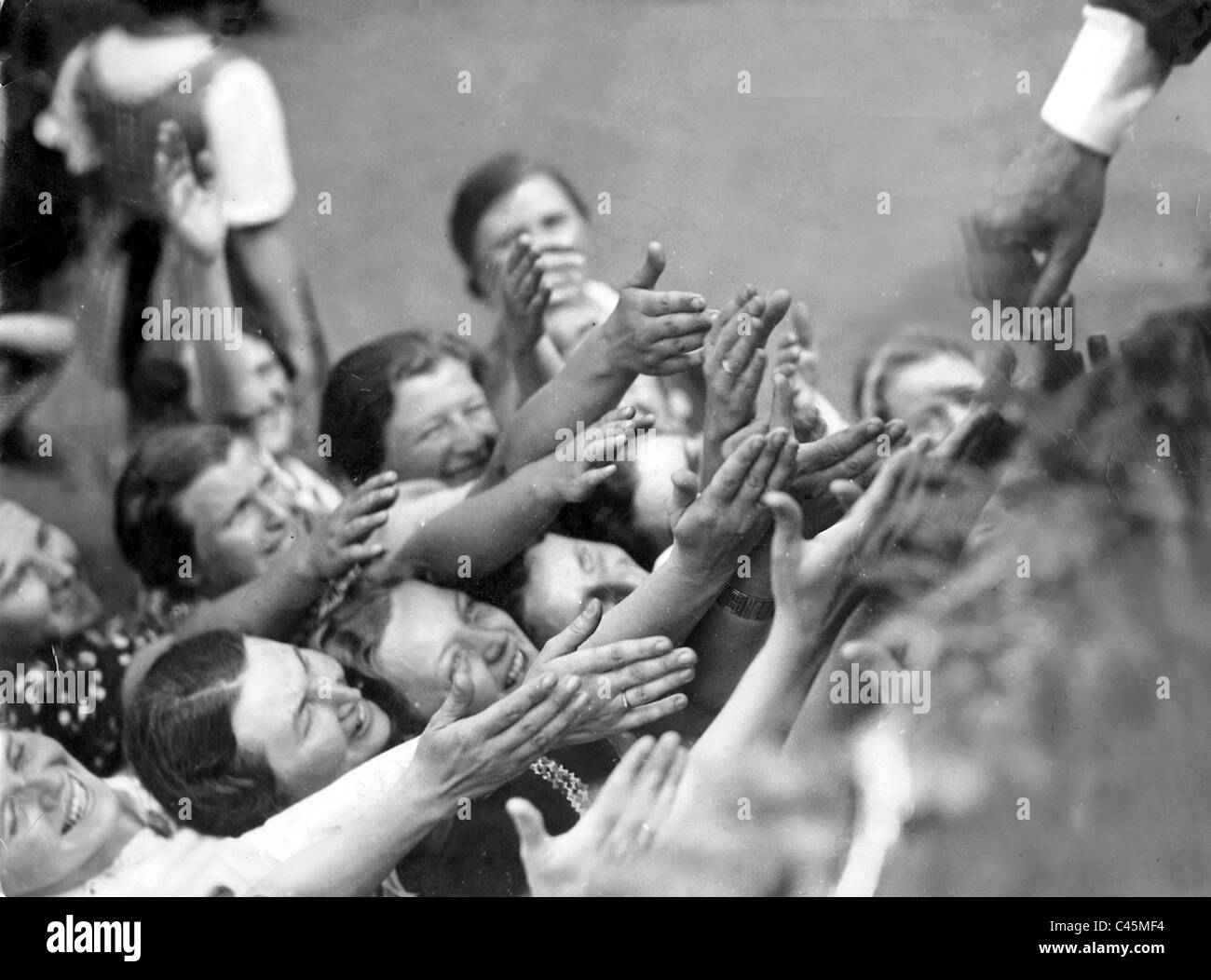 Mass enthusiasm in the National Socialism, 1938 Stock Photo