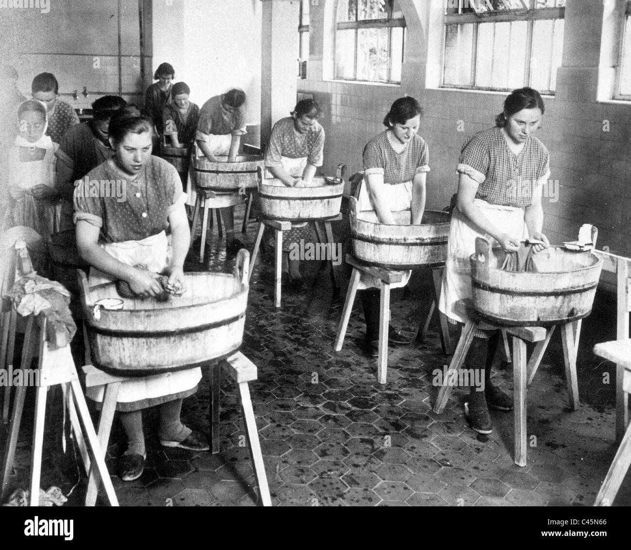 Girls doing laundry, 1930 Stock Photo