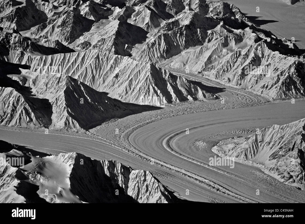 A winter view of Alaska's coastal range and two glaciers merging Stock Photo