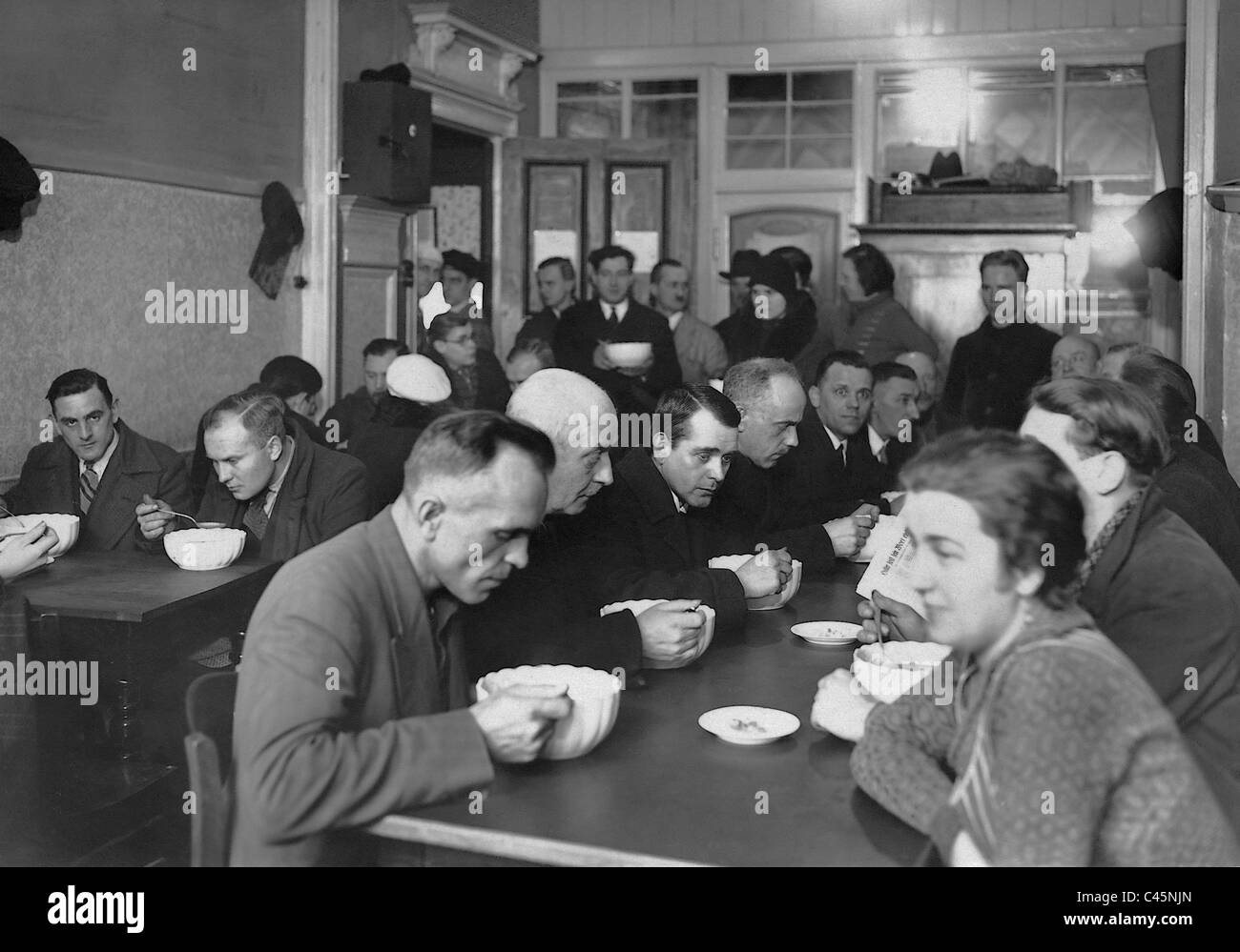 Dining room for the unemployed in Berlin, 1932 Stock Photo