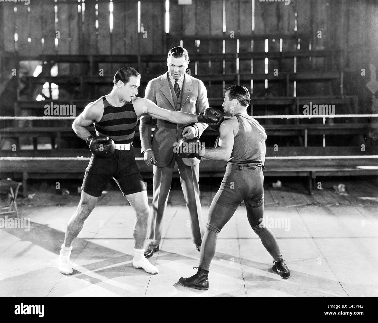 Rudolph Valentino at a boxing lesson Stock Photo