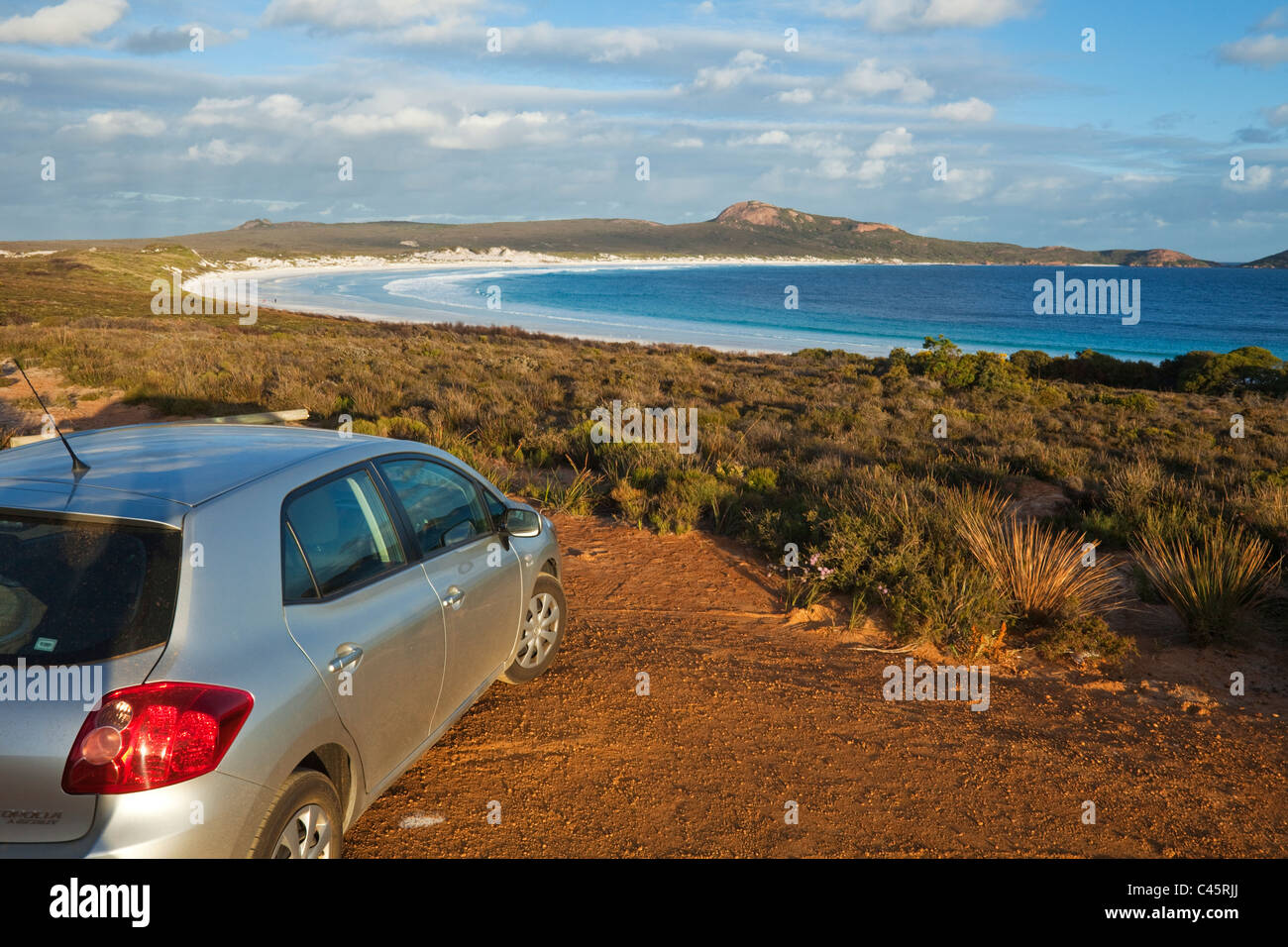 Car overlocking the beach at Lucky Bay. Cape Le Grand National Park