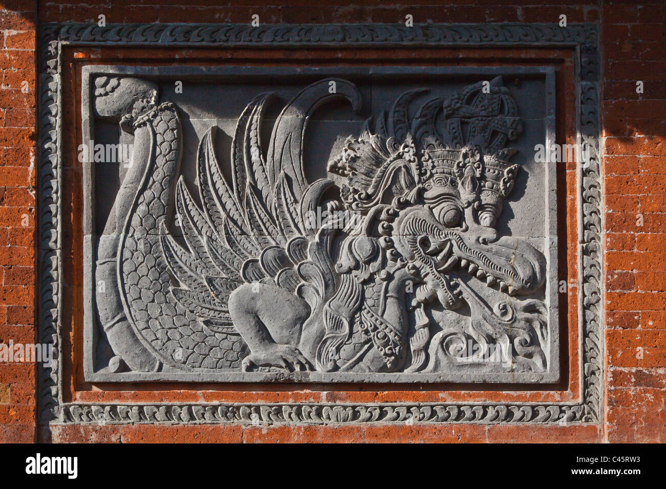 Ornate BAS RELIEF carvings decorate the PURA BESAKIH COMPLEX is located on the slope of sacred GGUNUNG AGUN, - BALI, INDONESIA Stock Photo