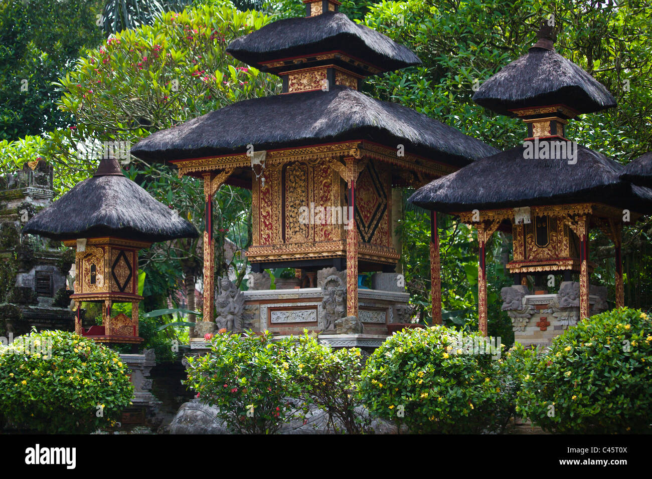 Three Hindu temples to Shiva, Brahma and Vishnu at PURA TAMAN SARASWATI - UBUD, BALI, INDONESIA Stock Photo