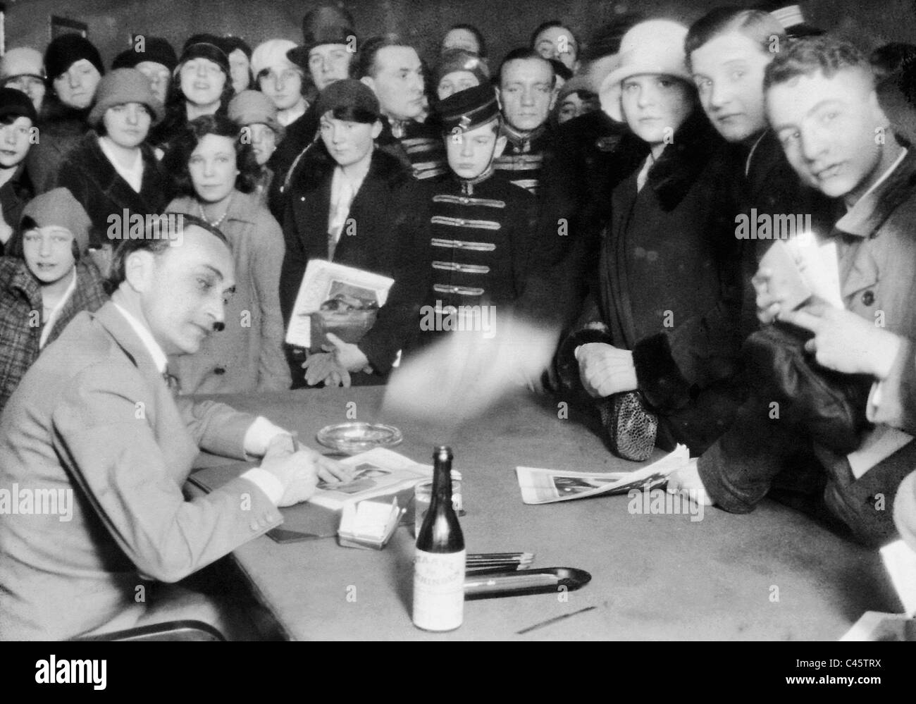 Conrad Veidt signs autographs Stock Photo