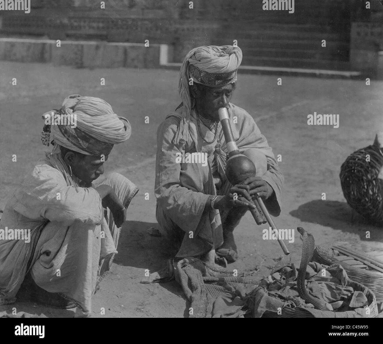 Snake charmer in India, 1934 Stock Photo