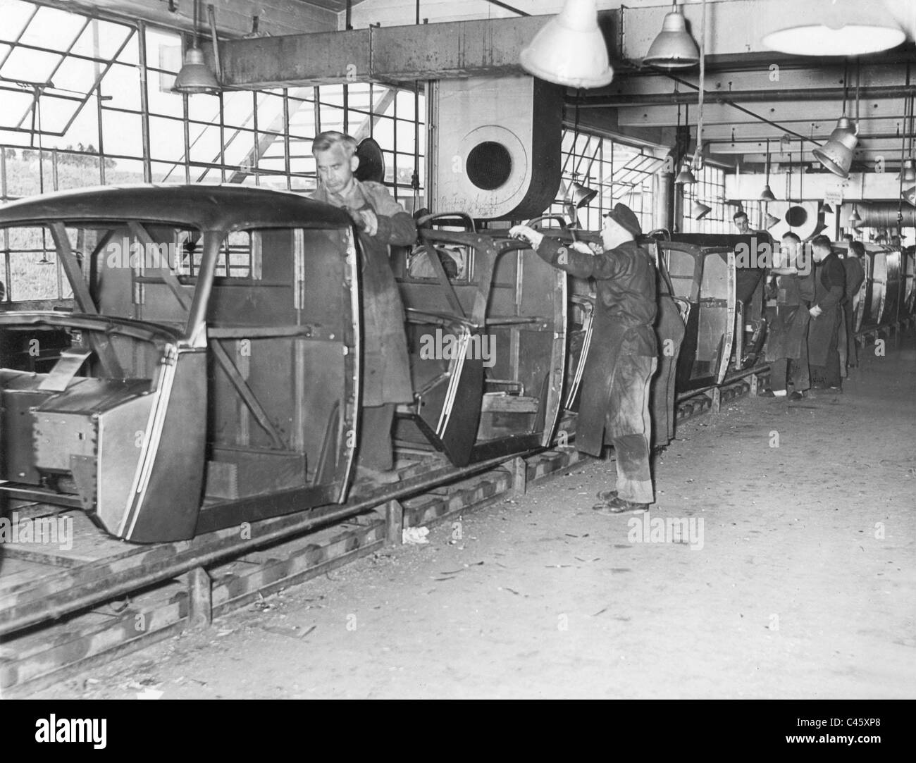 Completion of Opel Blitz cabins in the Opel factory in Brandenburg near Berlin, 1939 Stock Photo