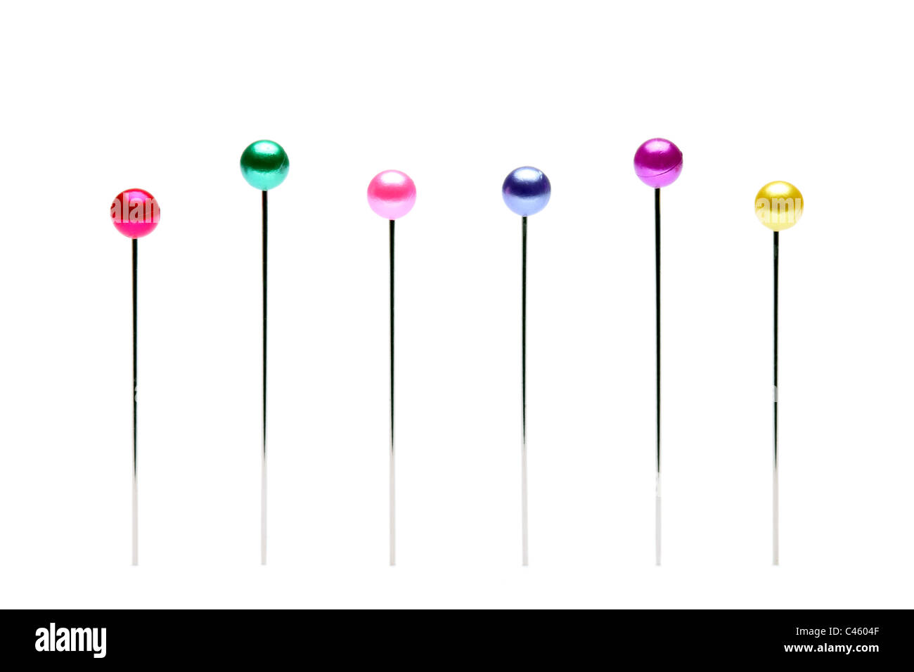 Colorful pins isolated on white background Stock Photo - Alamy