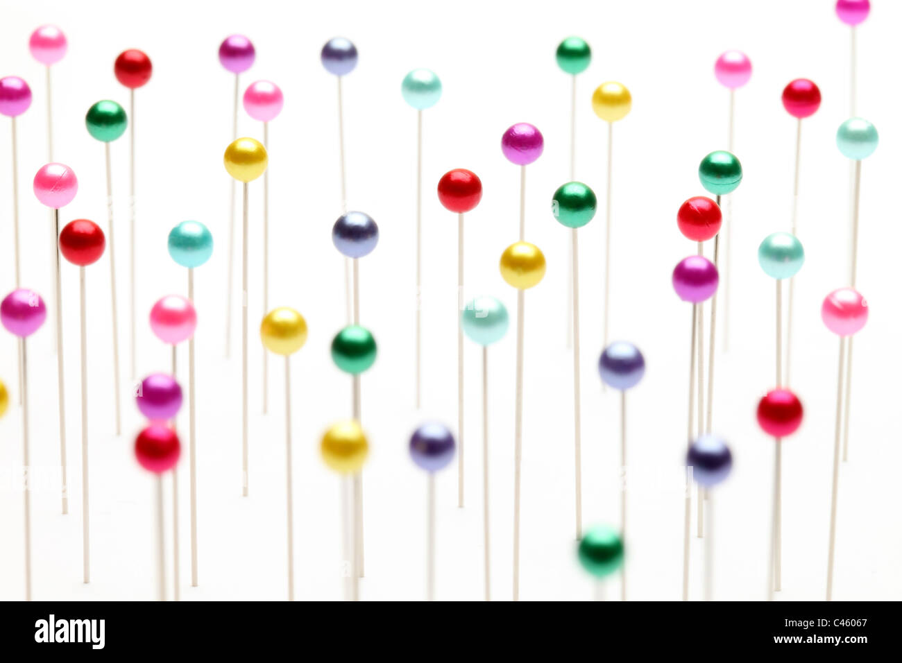 Colorful pins isolated on white background Stock Photo - Alamy