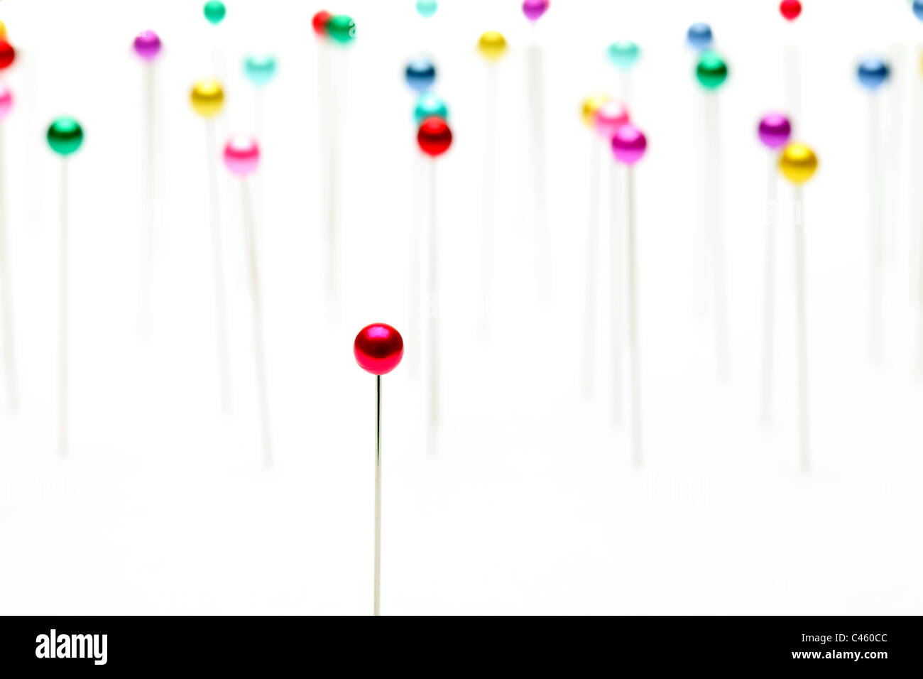 Colorful pins isolated on white background Stock Photo - Alamy