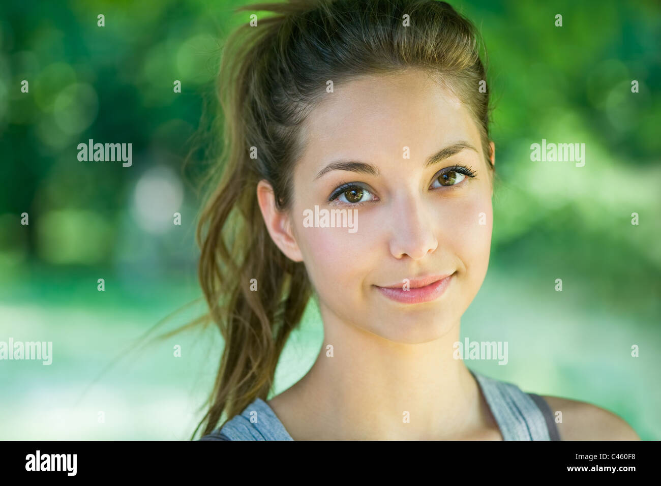 Outdoors portait of beautiful young brunette girl Stock Photo - Alamy