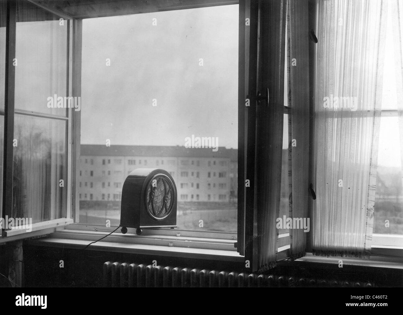 Radio in the open window of a Berlin tenement, 1931 Stock Photo