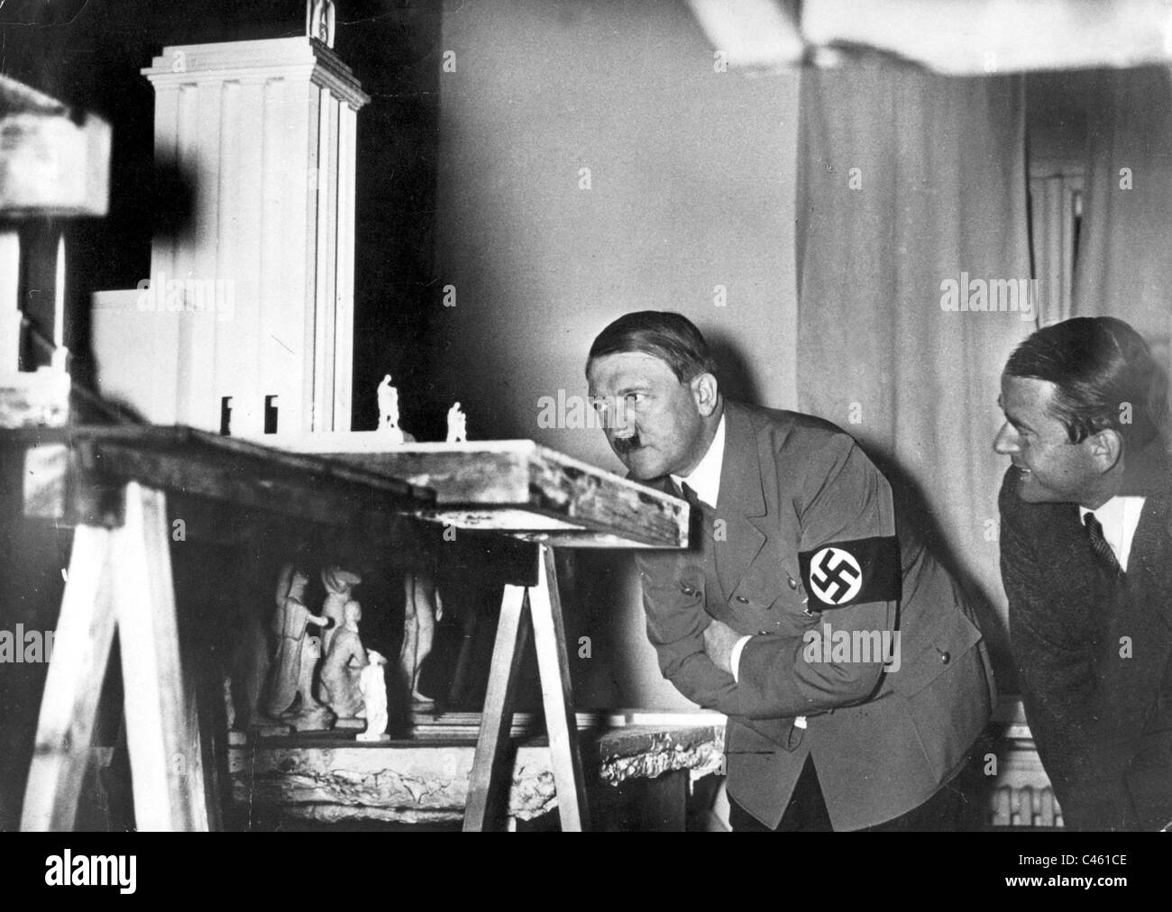 Adolf Hitler with Albert Speer in front of the model of the German Pavilion, 1937 Stock Photo